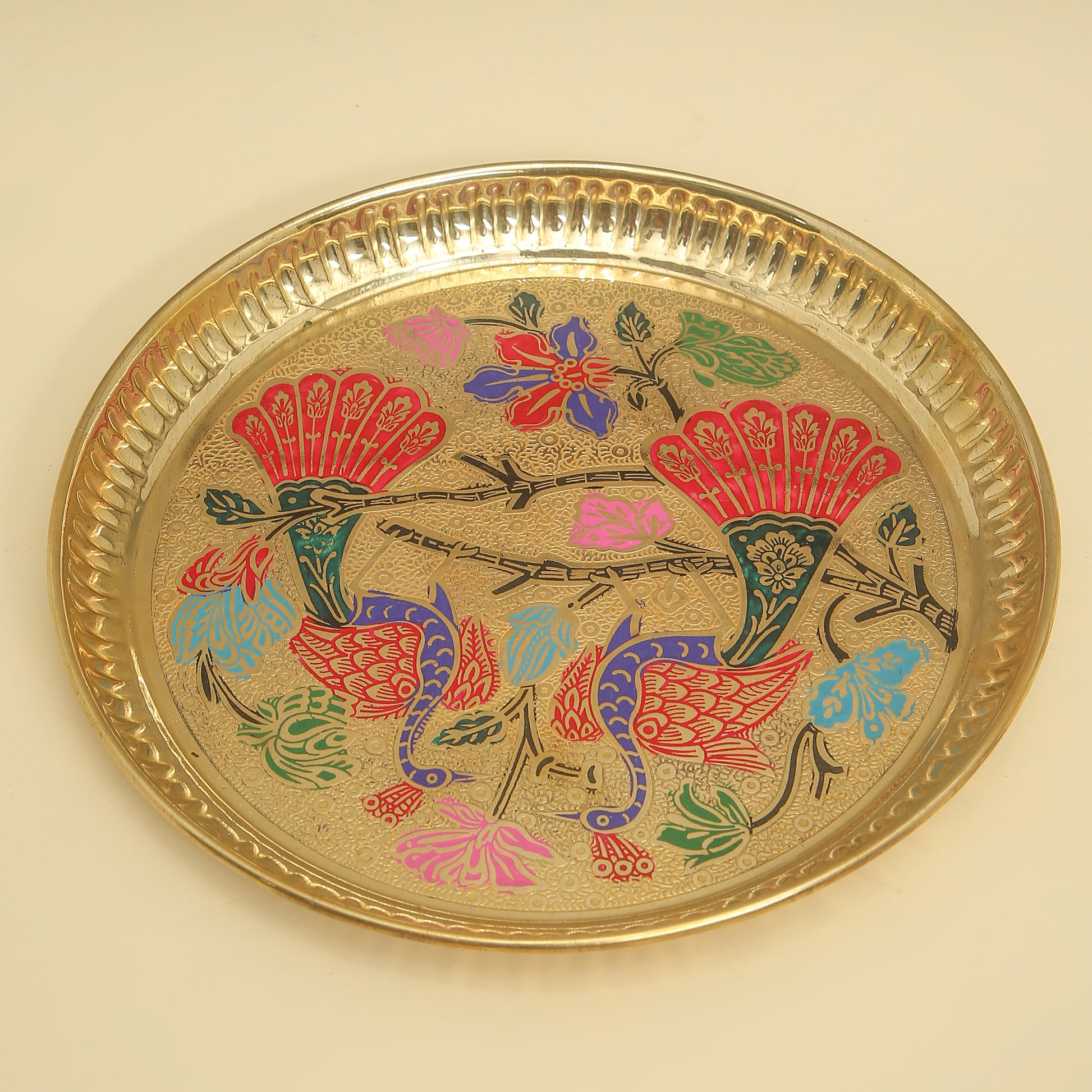 Decorative tray with colorful bird and floral design on a beige background