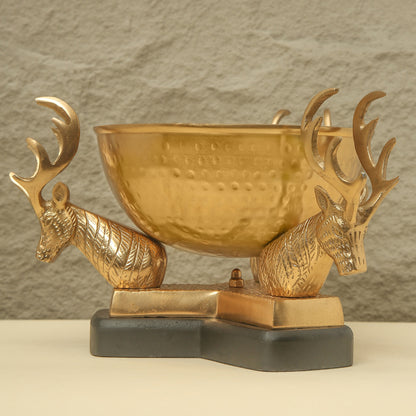 Gold trophy with deer heads on a gray background