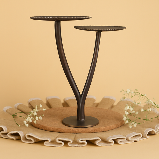 Decorative metal stand with round base on a beige background