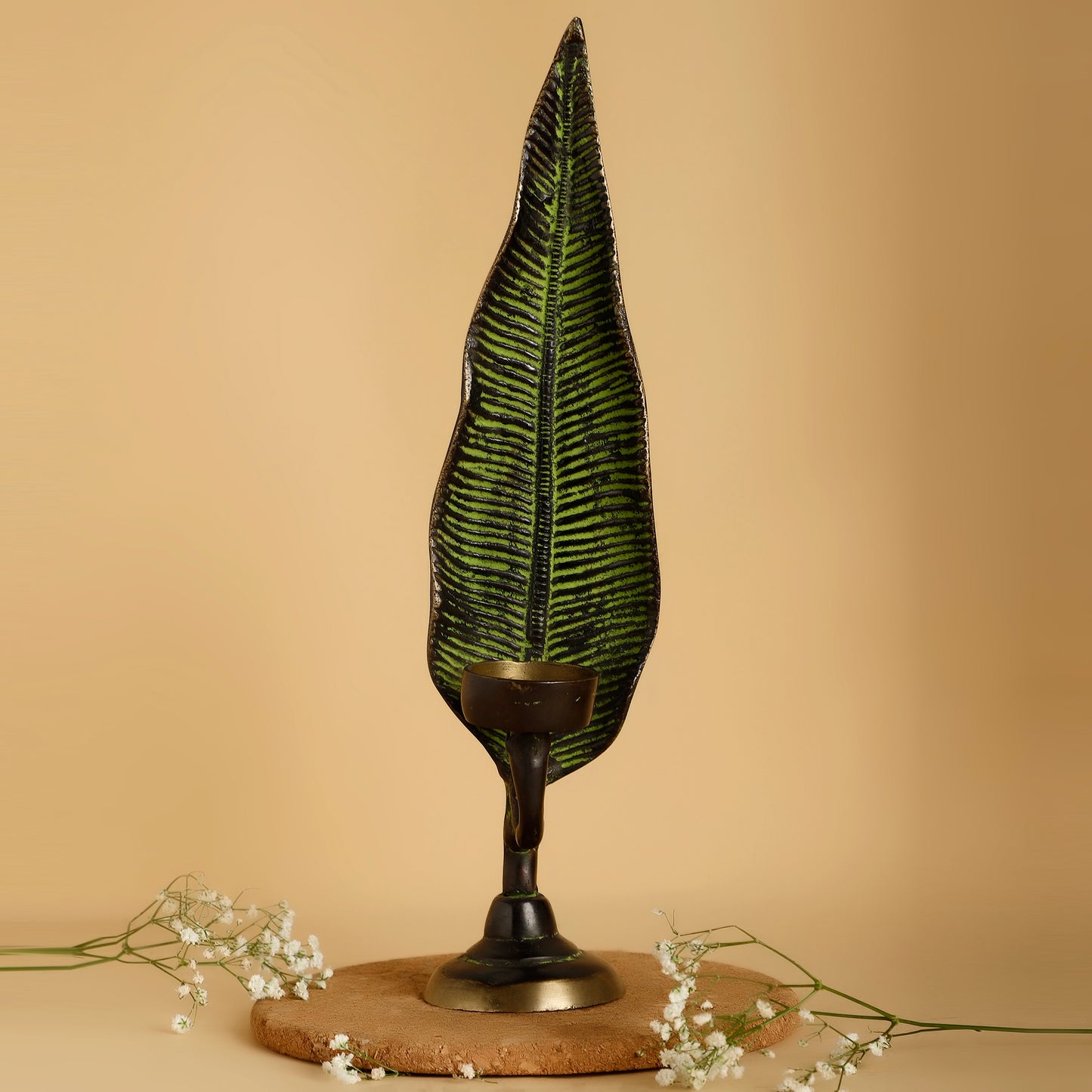 Decorative leaf lamp on a beige background