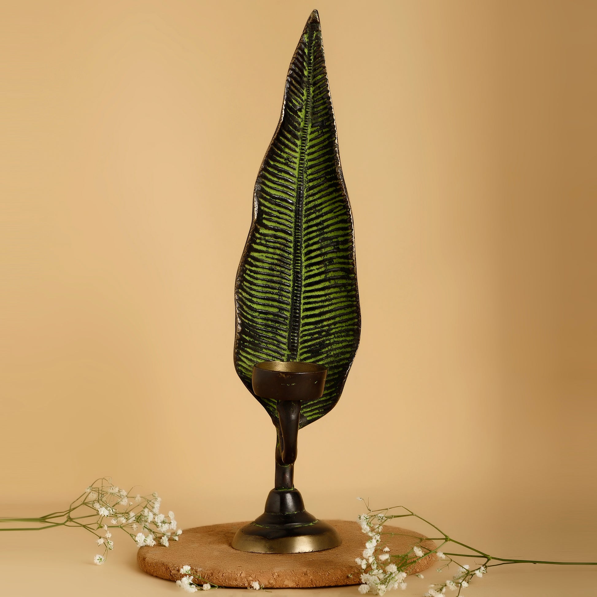 Decorative leaf lamp on a beige background