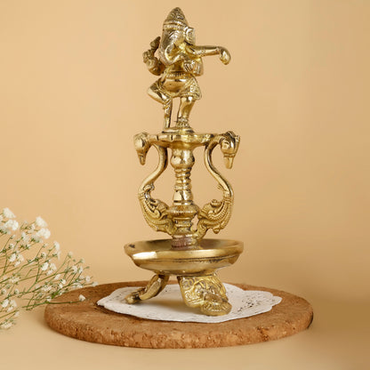 Brass Dancing Ganesh Diya with Base – Decorative Oil Lamp for Pooja & Festive Decor
