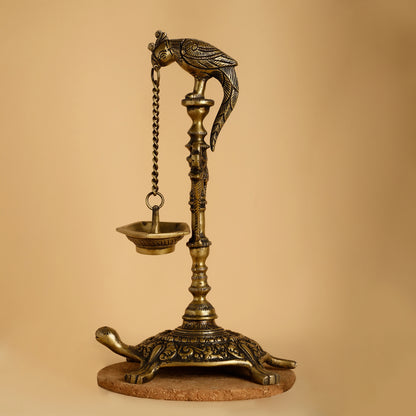 Brass Hanging Diya with Parrot and Turtle Base – Antique Temple-Style Oil Lamp