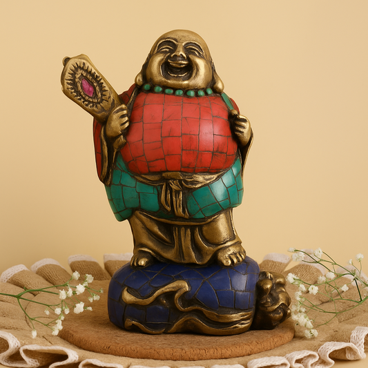 Decorative statue of a laughing Buddha on a beige background