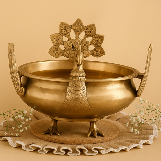 Bronze bowl with decorative peacock finial on a beige background